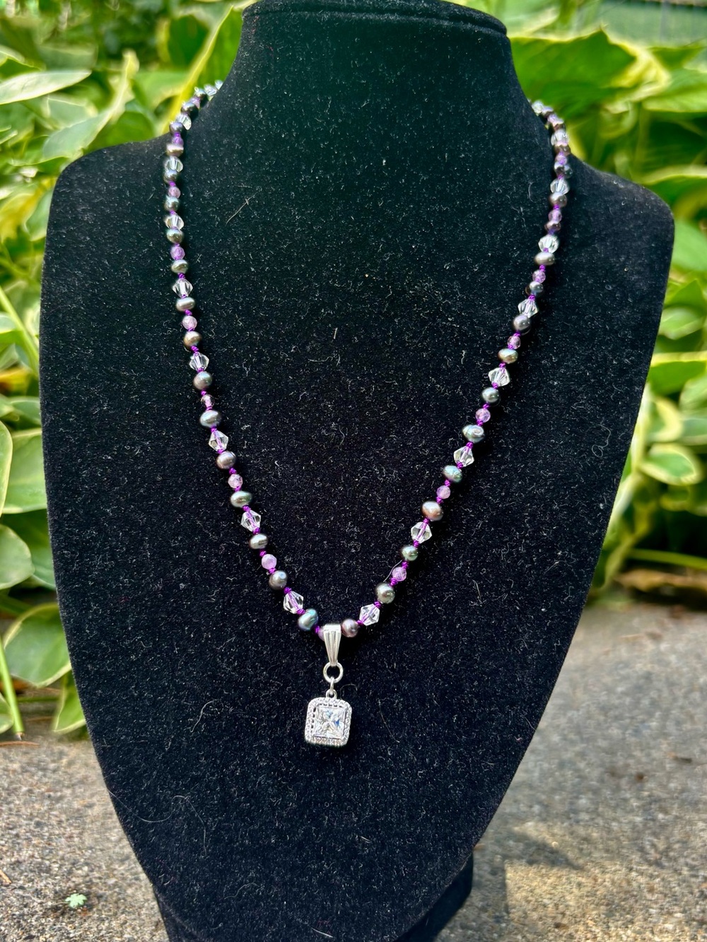 Sterling silver peacock pearl necklace.